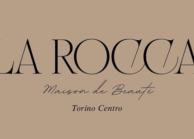 Logo di LA ROCCA MAIDON DE BEAUTE a Torino, Piemonte, IT su sfondo beige.