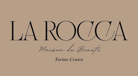Logo di LA ROCCA MAIDON DE BEAUTE a Torino, Piemonte, IT su sfondo beige.