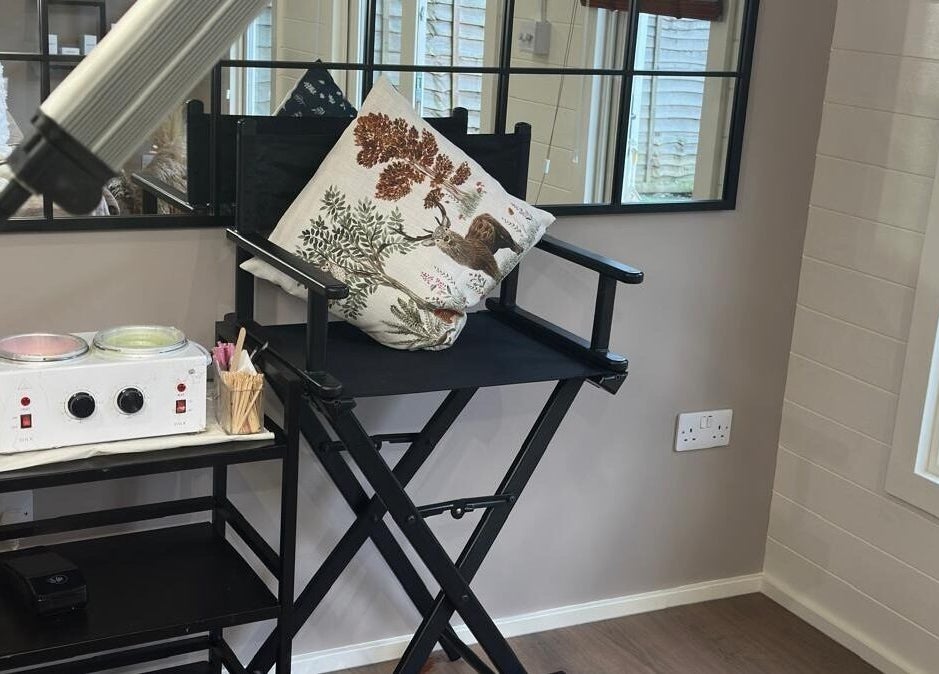 Beauty treatment chair and wax setup at The Skin Chalet, Headley, England, GB, offering tranquil luxury.