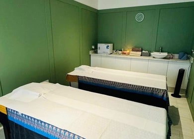 Relaxing massage room at Motion Remedy, Hornchurch, England, GB, featuring two massage tables.