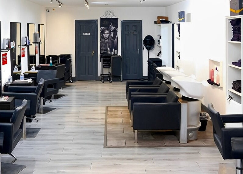 Interior of Sophie Li Hair Design in Dublin, County Dublin, IE, featuring modern salon chairs and sleek decor.