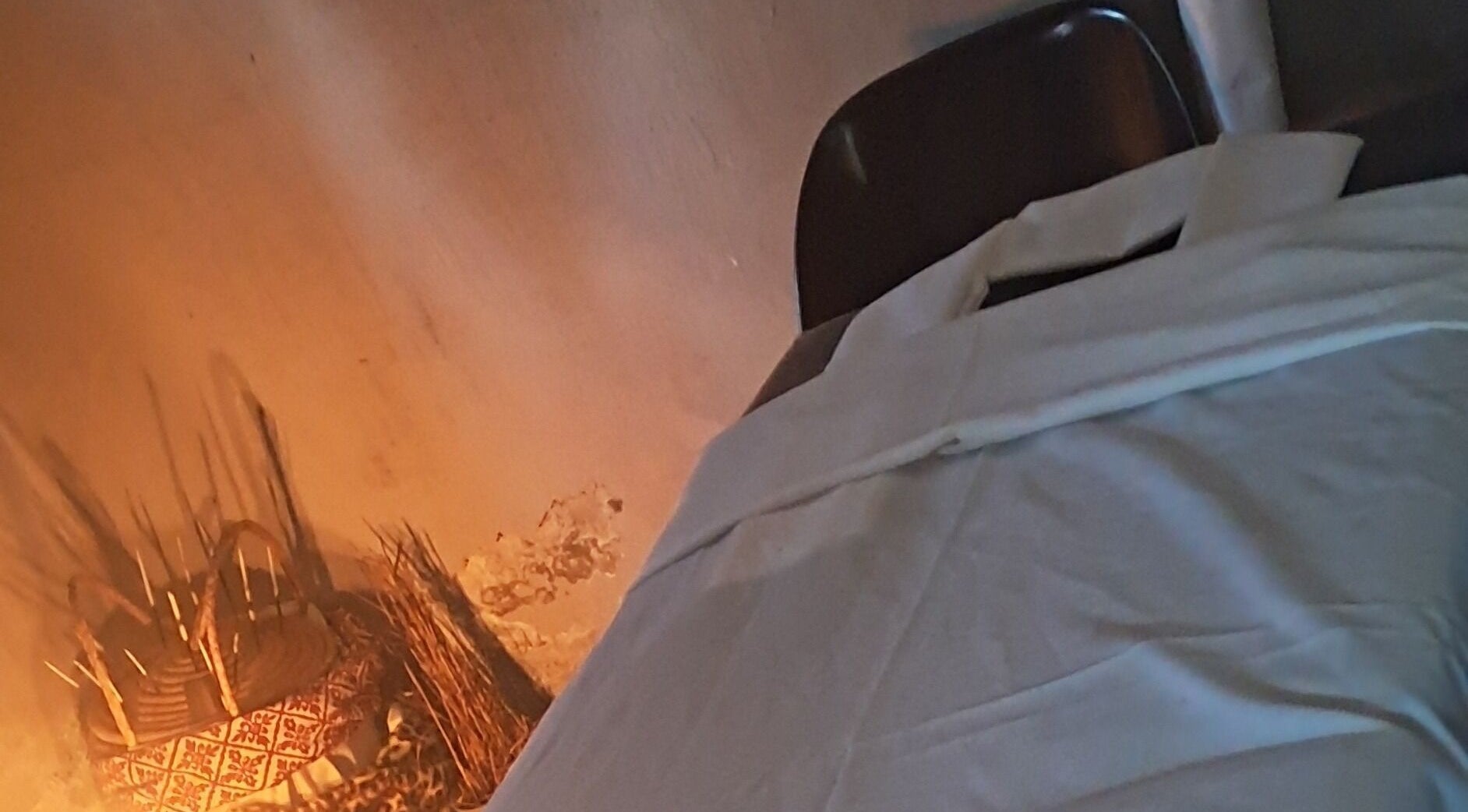 Relaxing spa room at Neo ea Afrika Wellness, Midrand, Gauteng, ZA with massage table and natural decor.