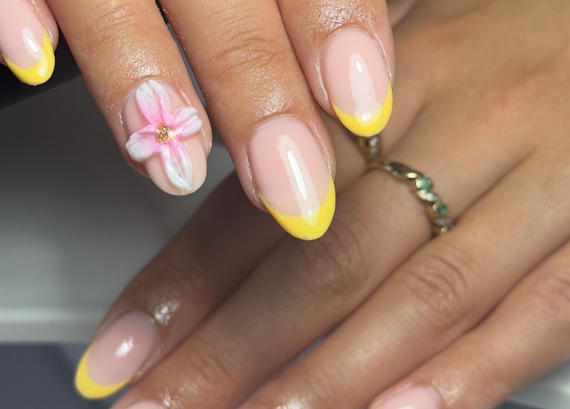 Elegant floral and yellow French manicure at Toni’s Beauty Lounge, Towcester, England, GB.