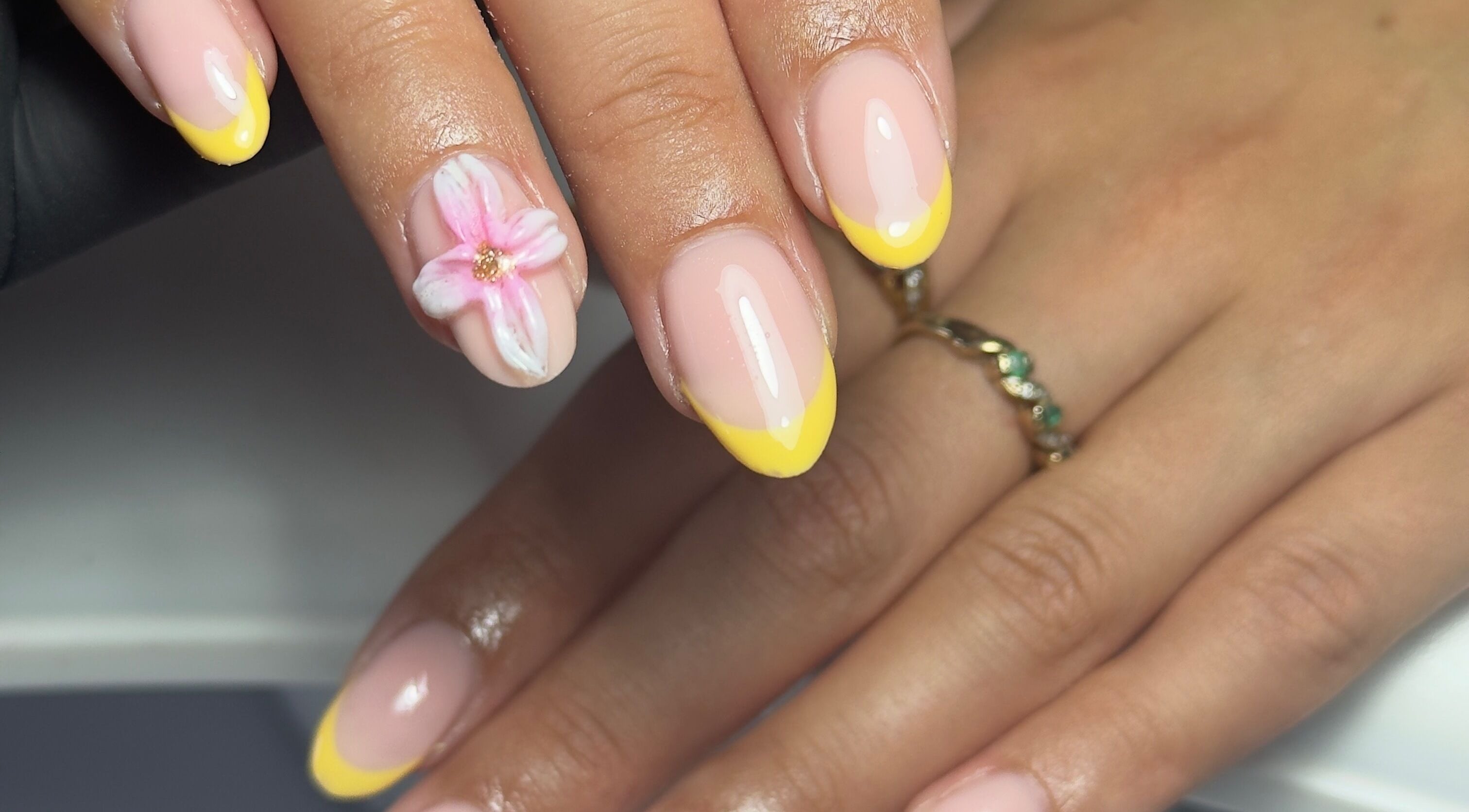 Elegant floral and yellow French manicure at Toni’s Beauty Lounge, Towcester, England, GB.