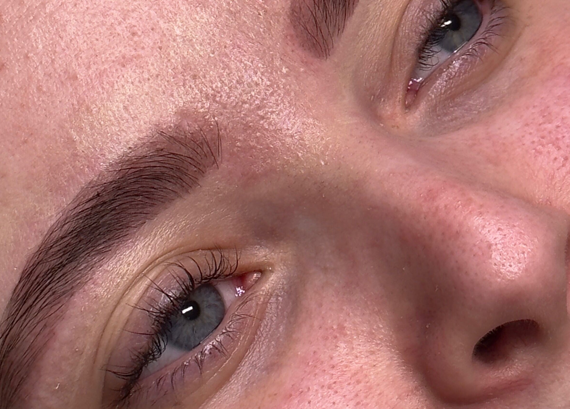 Close-up of groomed eyebrows at Toni's Beauty Lounge, Towcester, England, GB.