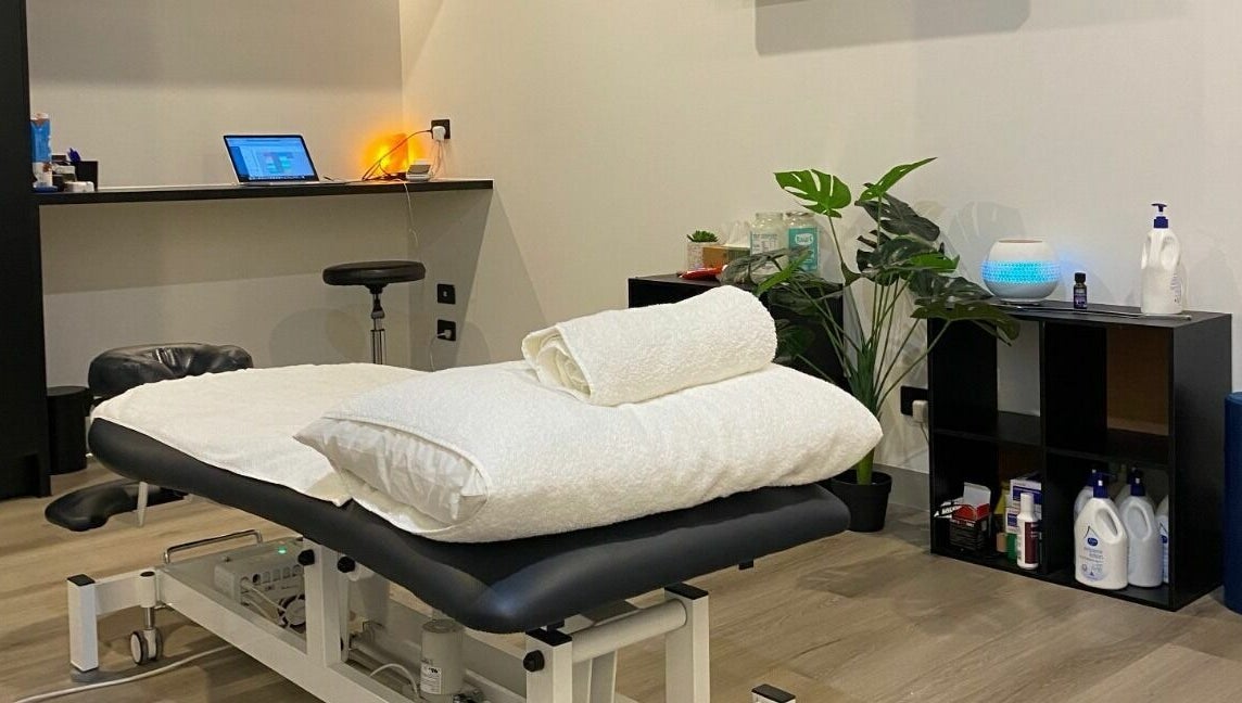 Serene treatment room at Cure HQ Recovery, Niddrie, Victoria, AU with a massage table and ambient lighting.