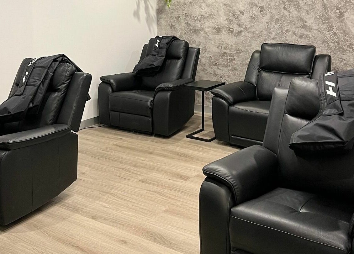 Cozy leather recliners at Cure HQ Recovery in Niddrie, Victoria, AU, create a serene and relaxing environment.