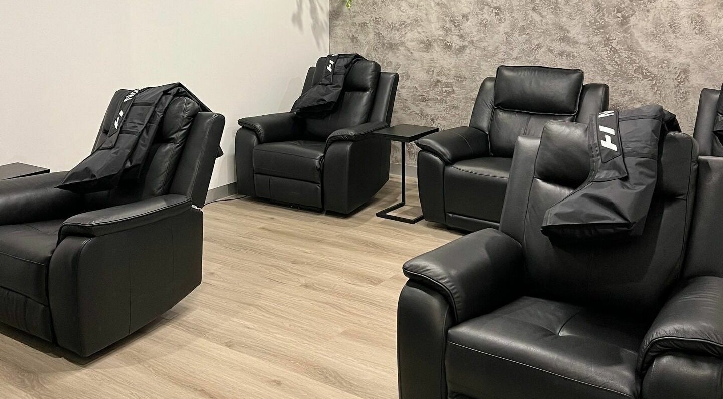 Cozy leather recliners at Cure HQ Recovery in Niddrie, Victoria, AU, create a serene and relaxing environment.