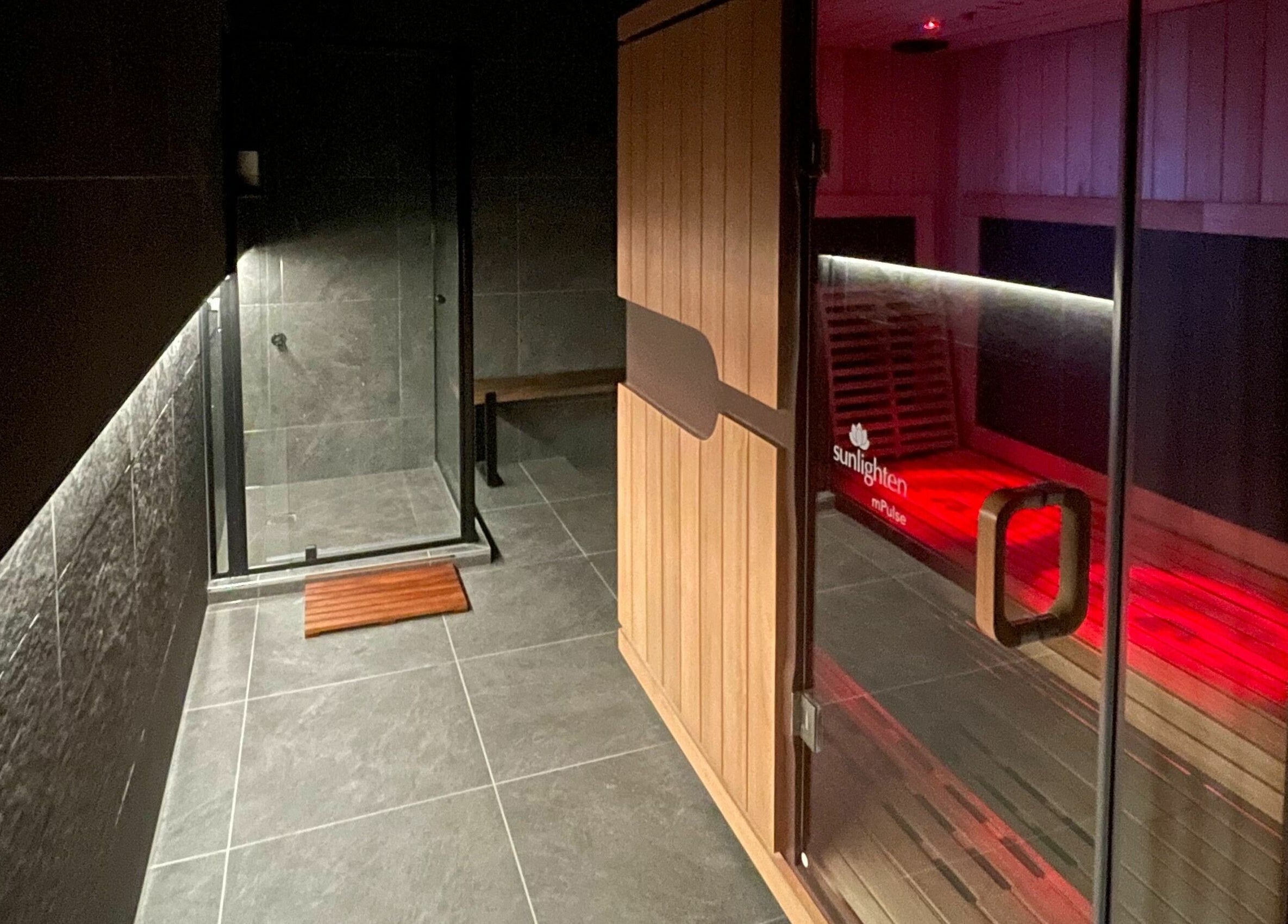 Modern sauna room at Cure HQ Recovery, Niddrie, Victoria, AU, offering tranquil relaxation.