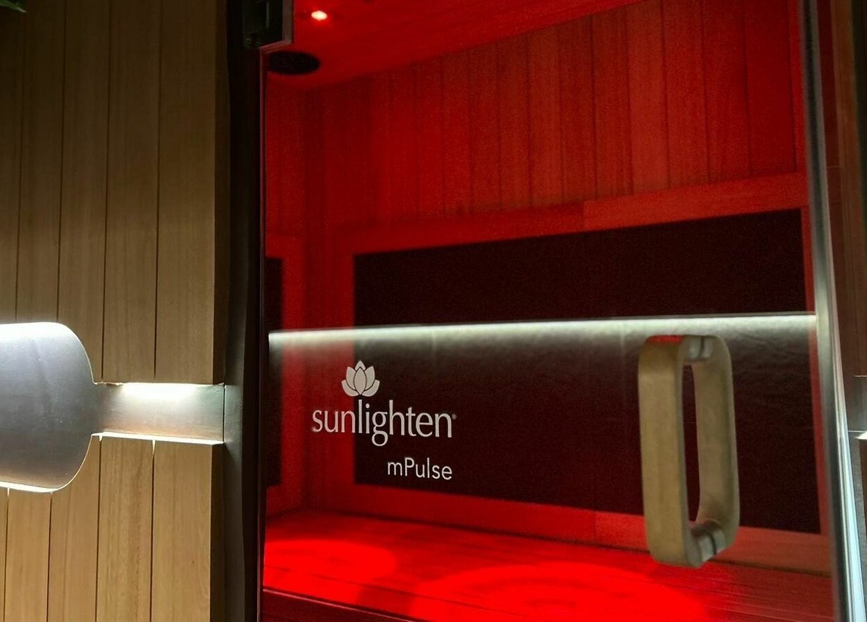 Sunlighten mPulse infrared sauna at Cure HQ Recovery, Niddrie, Victoria, AU with ambient red lighting.