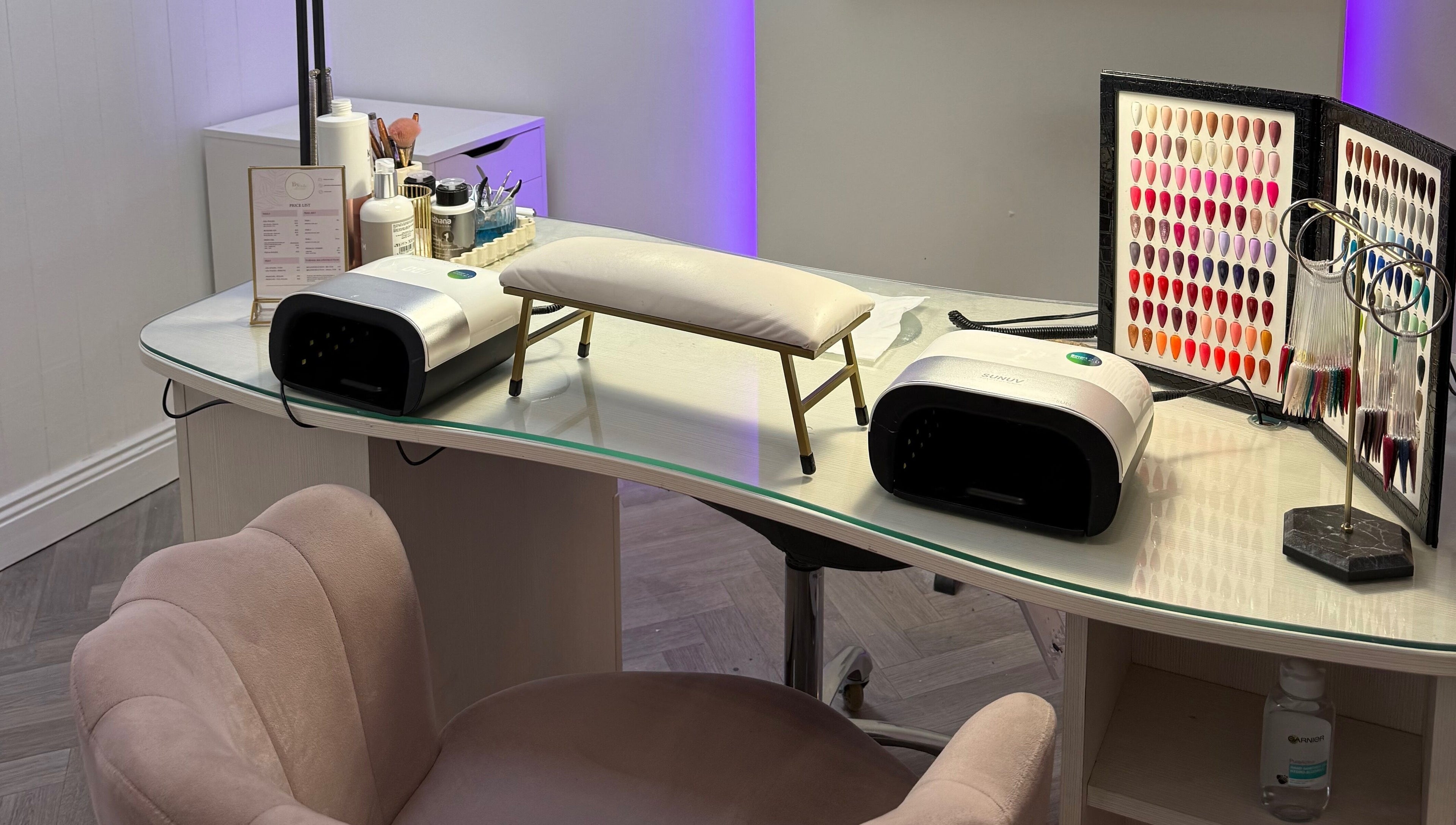 Nail care setup at By Orla Nails & Beauty in Boyle, County Roscommon, IE featuring tools and color options.