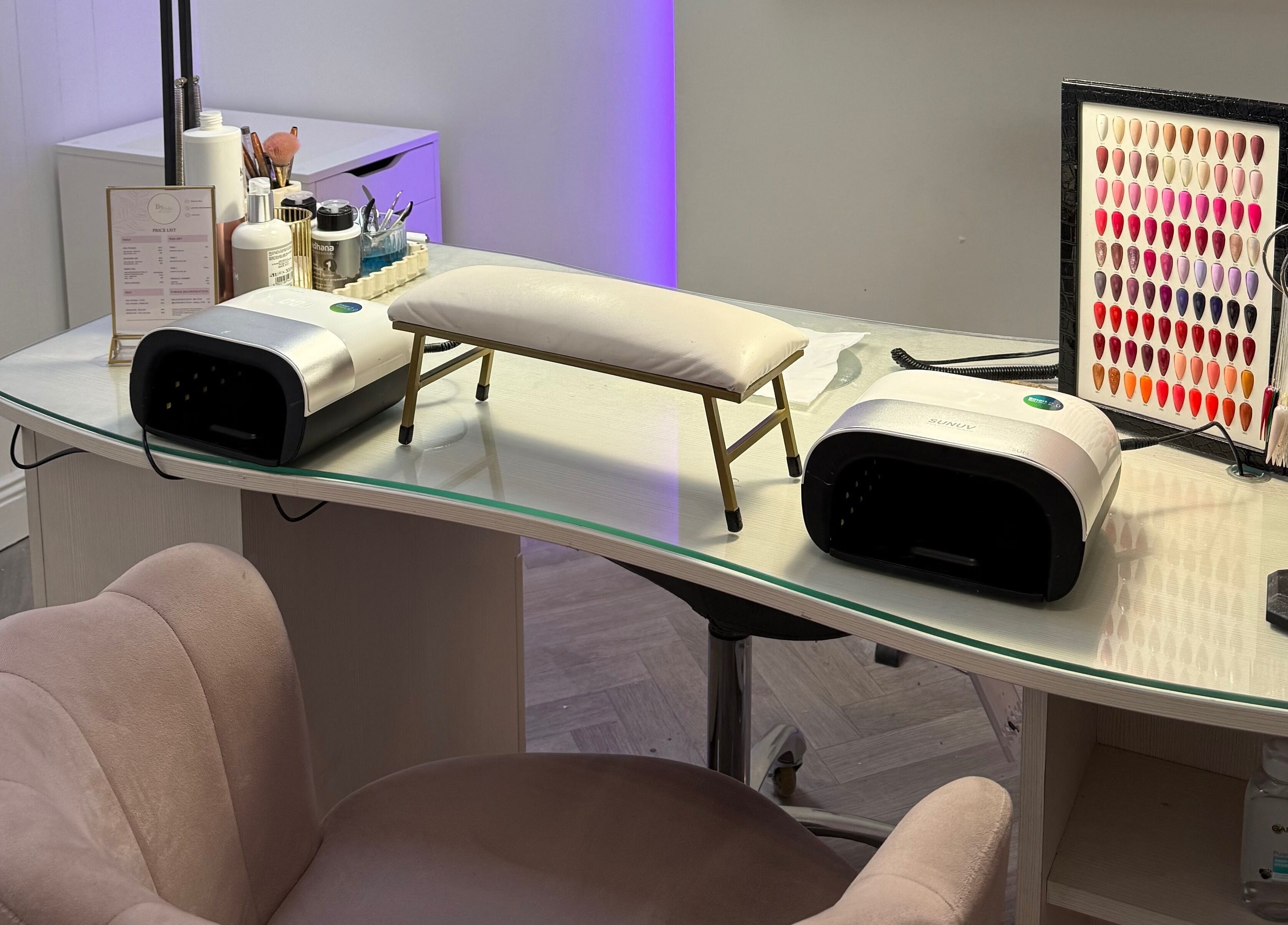 Nail care setup at By Orla Nails & Beauty in Boyle, County Roscommon, IE featuring tools and color options.