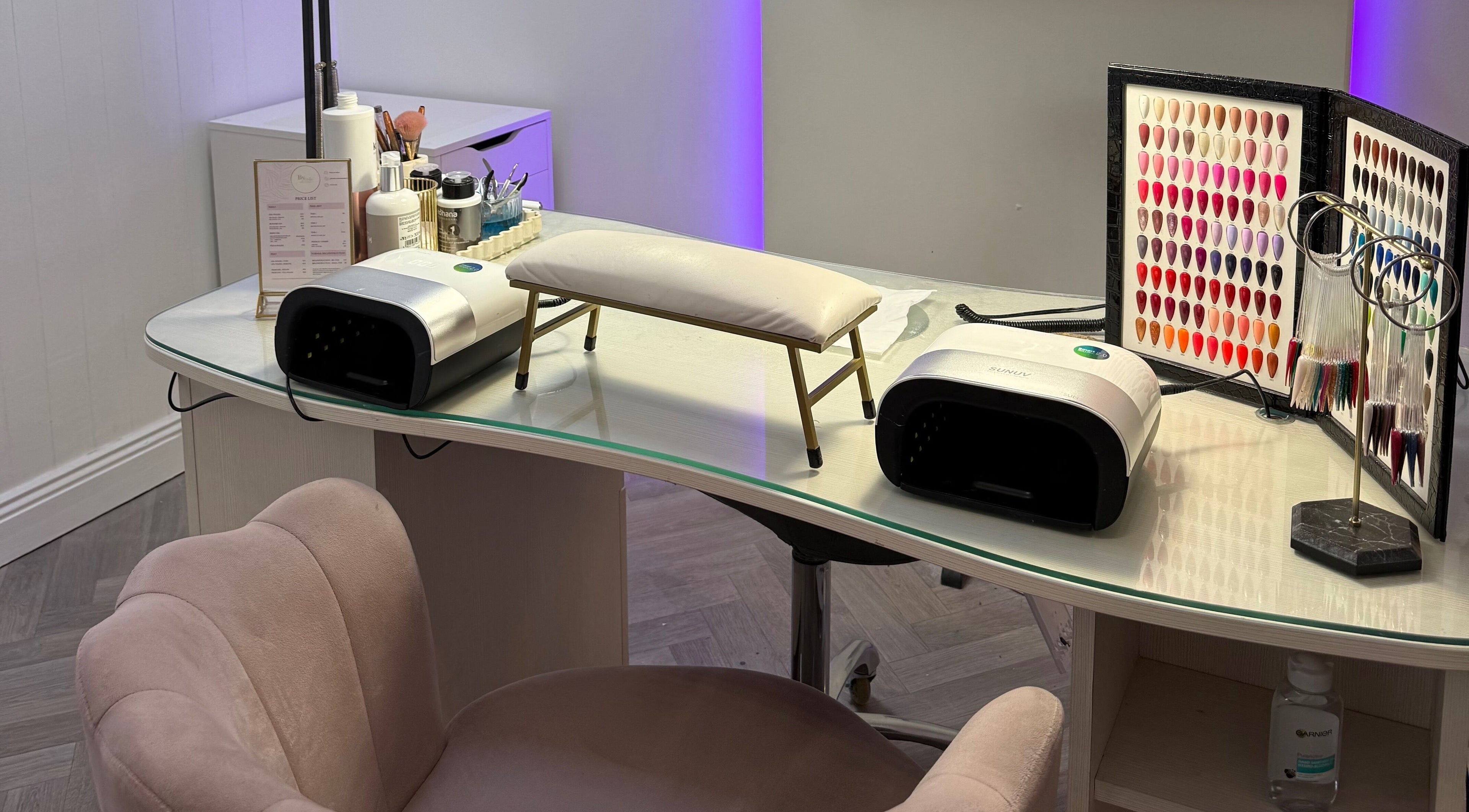 Nail care setup at By Orla Nails & Beauty in Boyle, County Roscommon, IE featuring tools and color options.