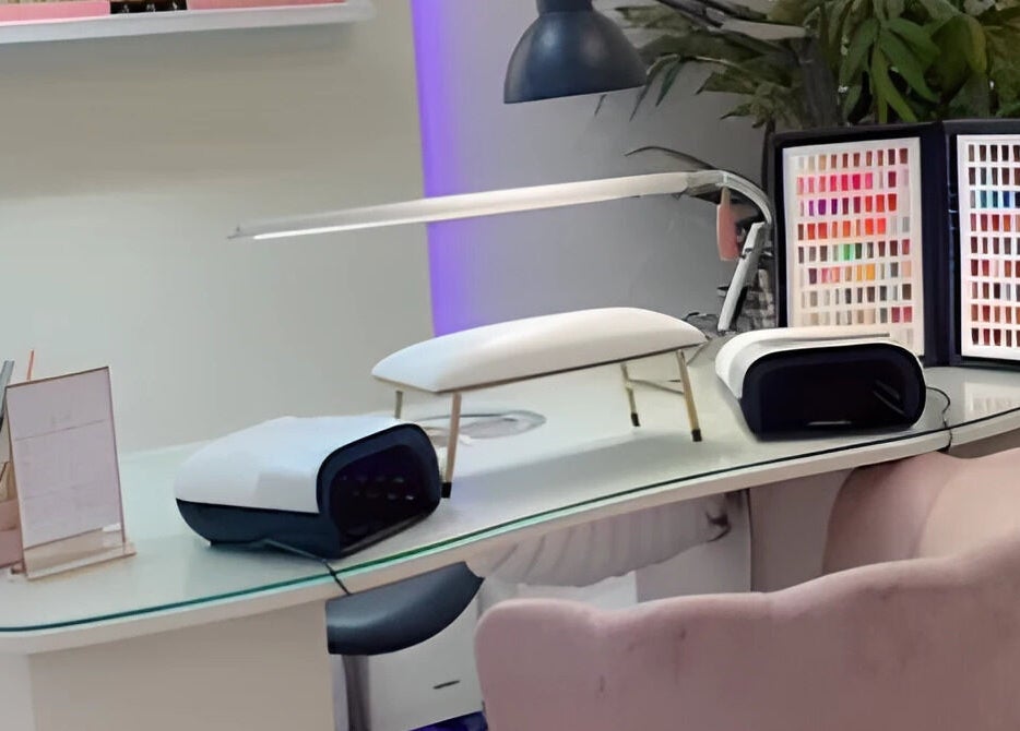 Modern nail station at By Orla Nails & Beauty, Boyle, County Roscommon, IE with colorful polish display.