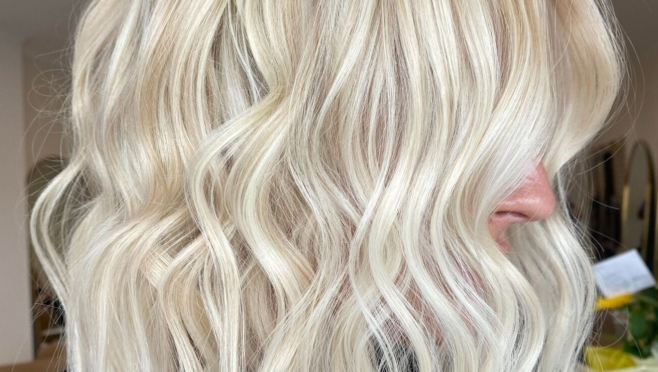 Close-up of wavy blonde hair styled at The Hair Sorority, Nerang, Queensland, AU.