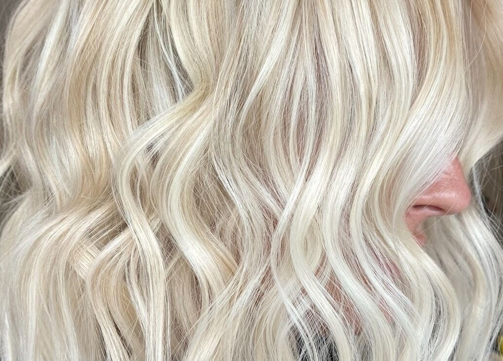 Close-up of wavy blonde hair styled at The Hair Sorority, Nerang, Queensland, AU.
