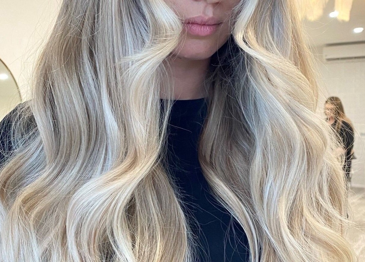 Blonde hair styled into soft waves at The Hair Sorority, Nerang, Queensland, AU.