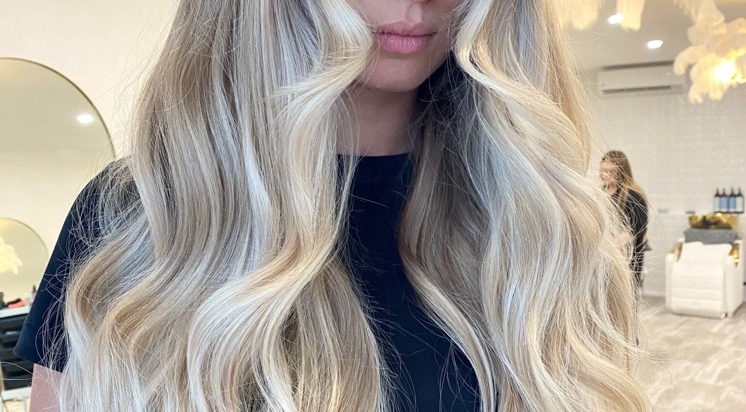 Blonde hair styled into soft waves at The Hair Sorority, Nerang, Queensland, AU.