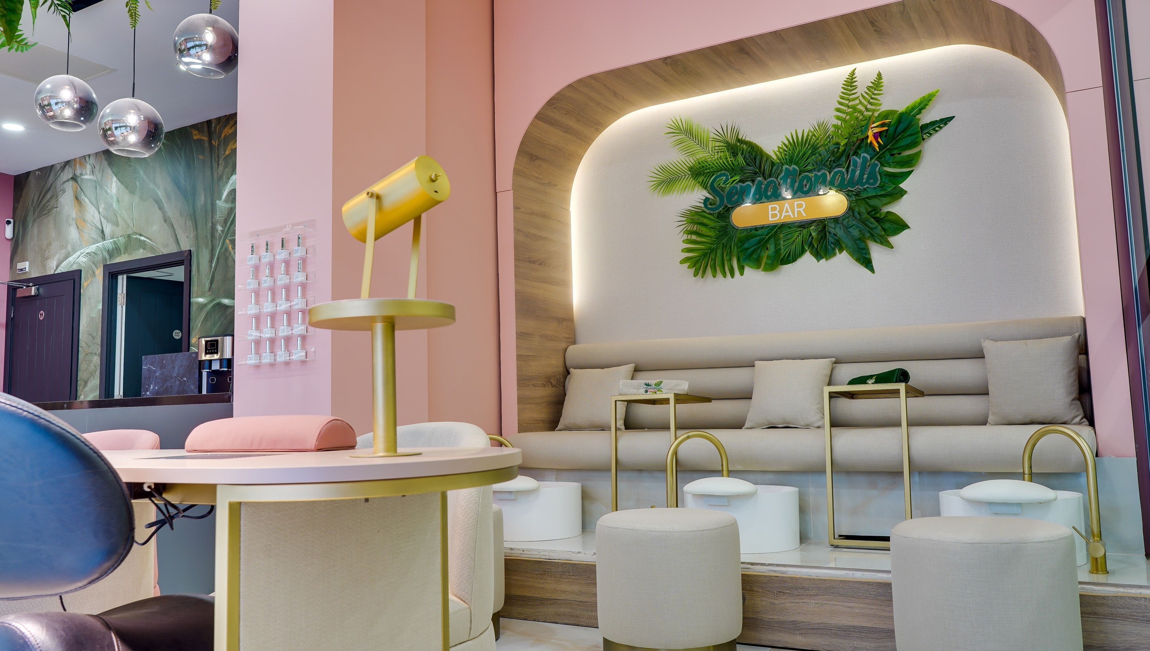 Sensationails Bar's elegant interior with pastel decor in London, England, GB, offering a calming beauty experience.