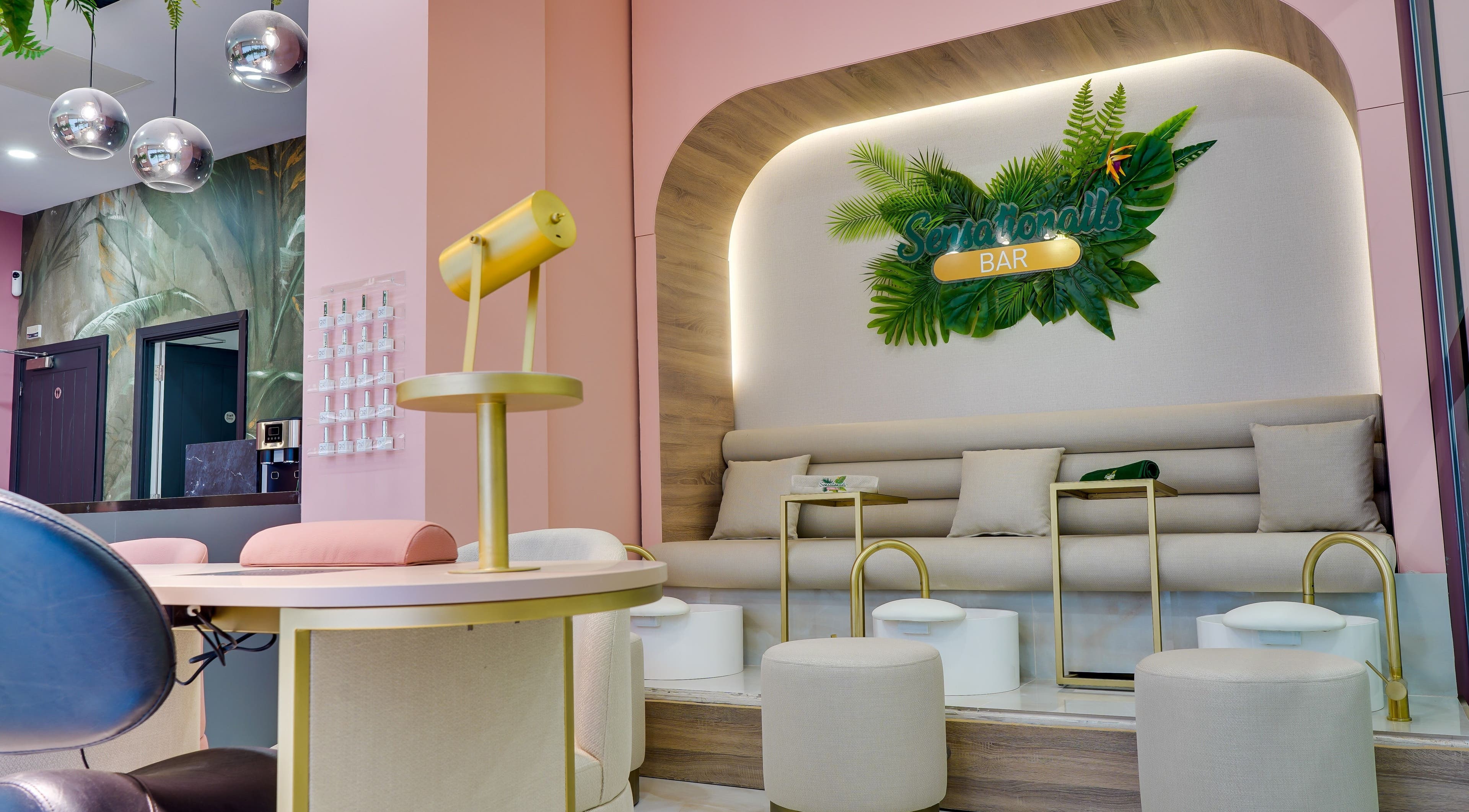 Sensationails Bar's elegant interior with pastel decor in London, England, GB, offering a calming beauty experience.
