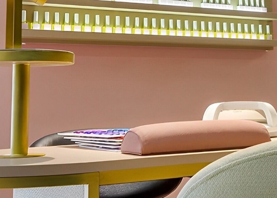 Sophisticated manicure station at Sensationails Bar in London, England, GB with nail polish display.