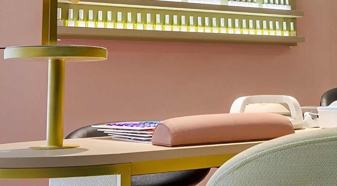 Sophisticated manicure station at Sensationails Bar in London, England, GB with nail polish display.