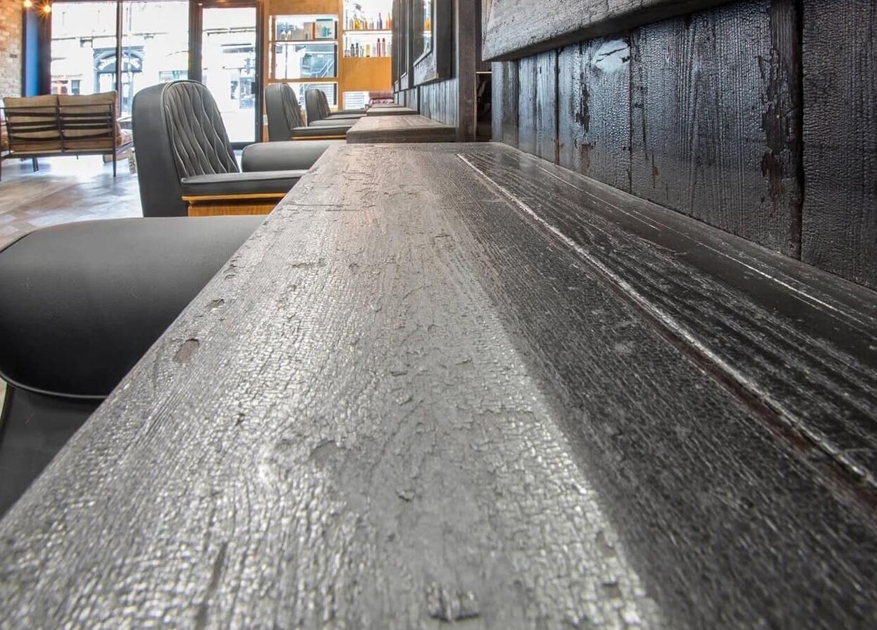 Modern interior of Rachael the Barber at Aiden Garlington Hair Design, Bristol, England, GB.