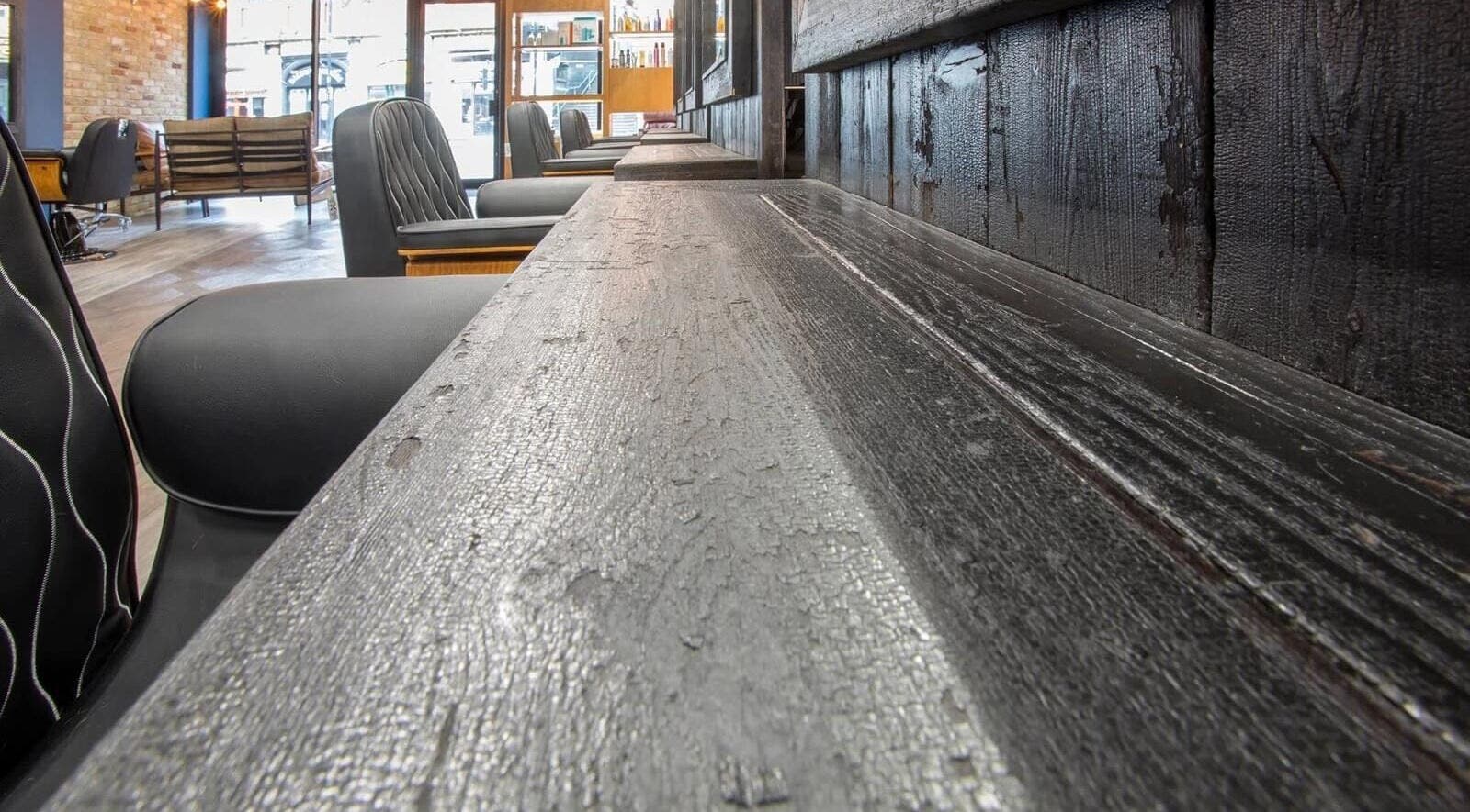 Modern interior of Rachael the Barber at Aiden Garlington Hair Design, Bristol, England, GB.