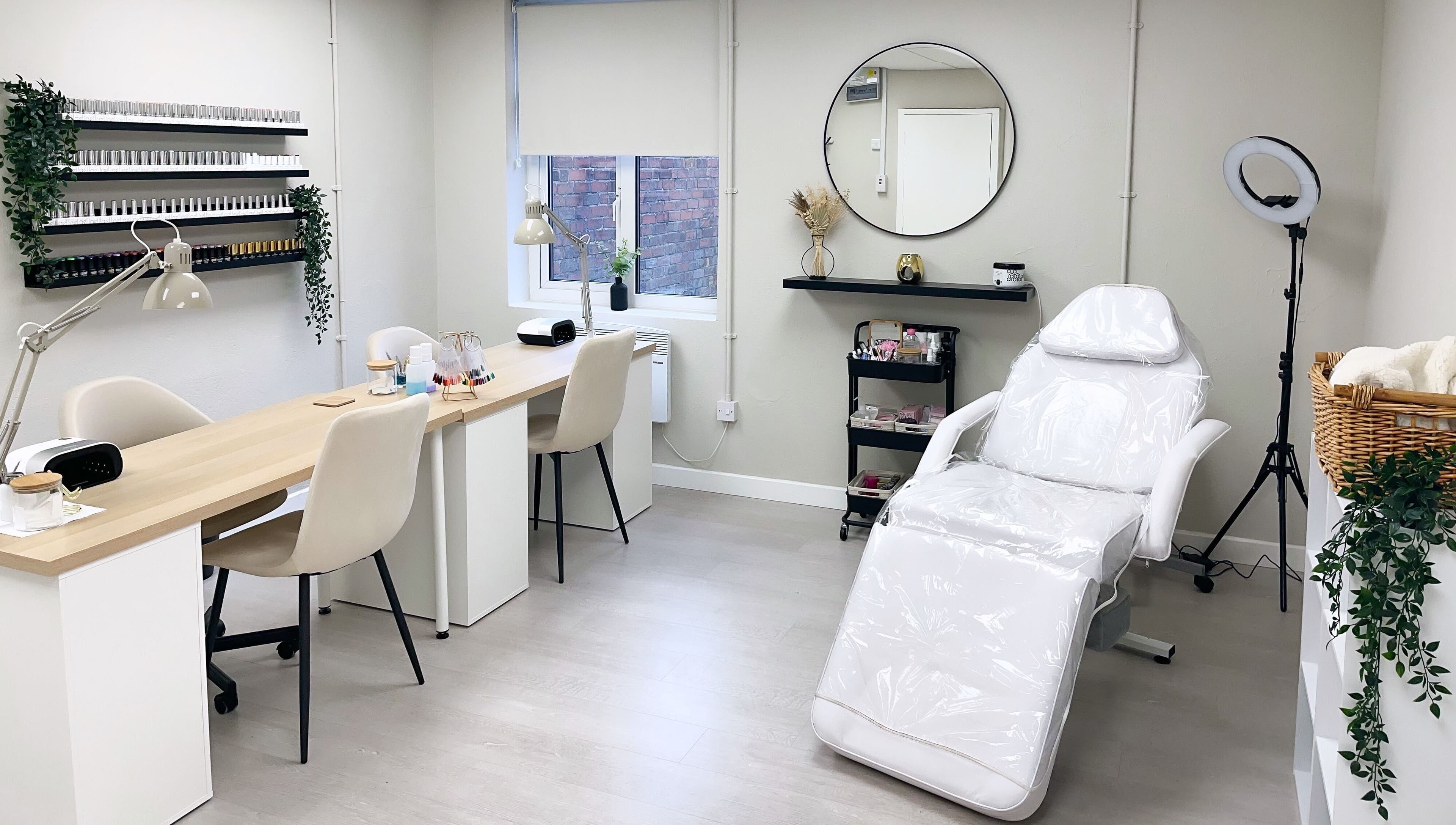 Relaxing treatment room at The Glam Studio, Farsley, Leeds, England, GB featuring stylish decor and equipment.