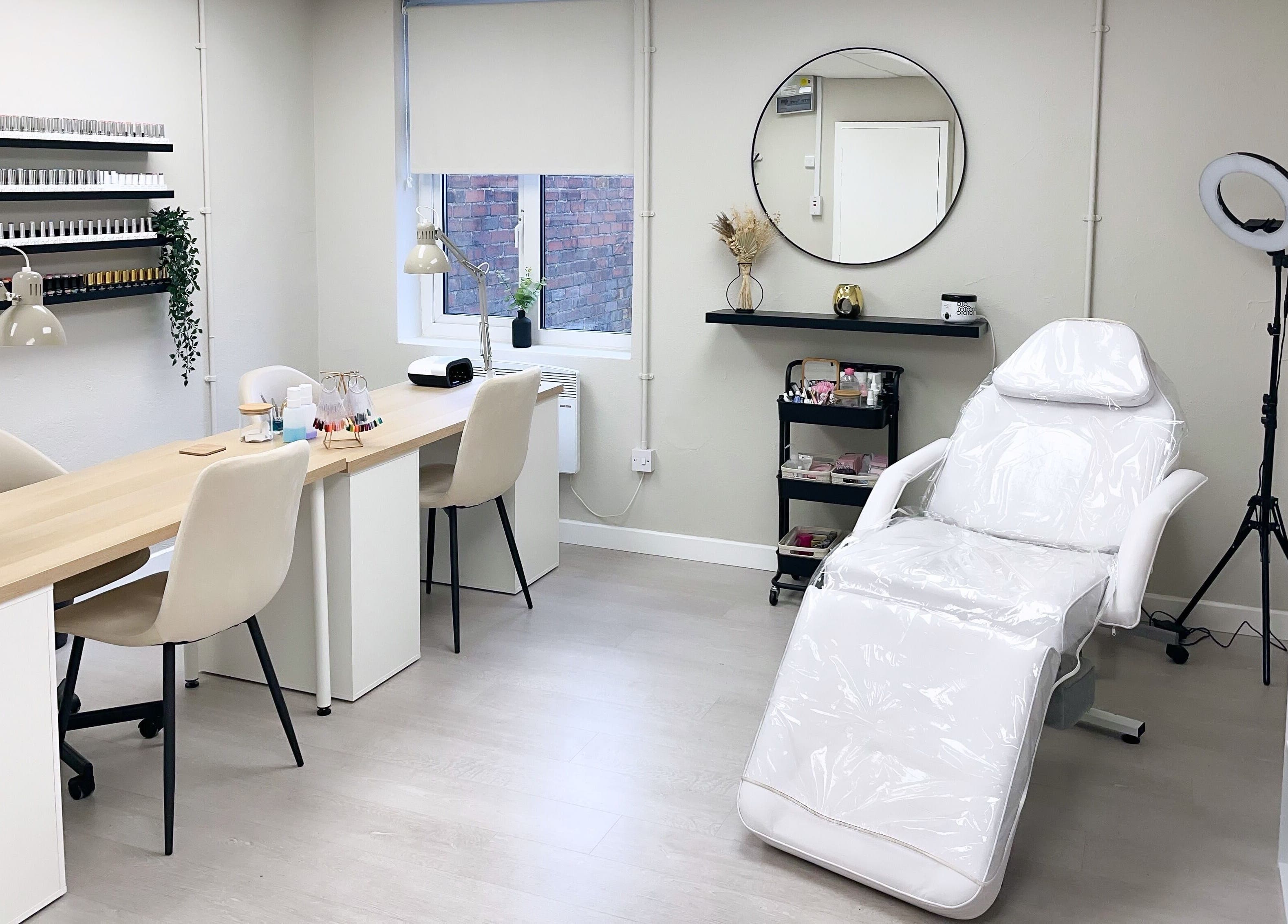 Relaxing treatment room at The Glam Studio, Farsley, Leeds, England, GB featuring stylish decor and equipment.
