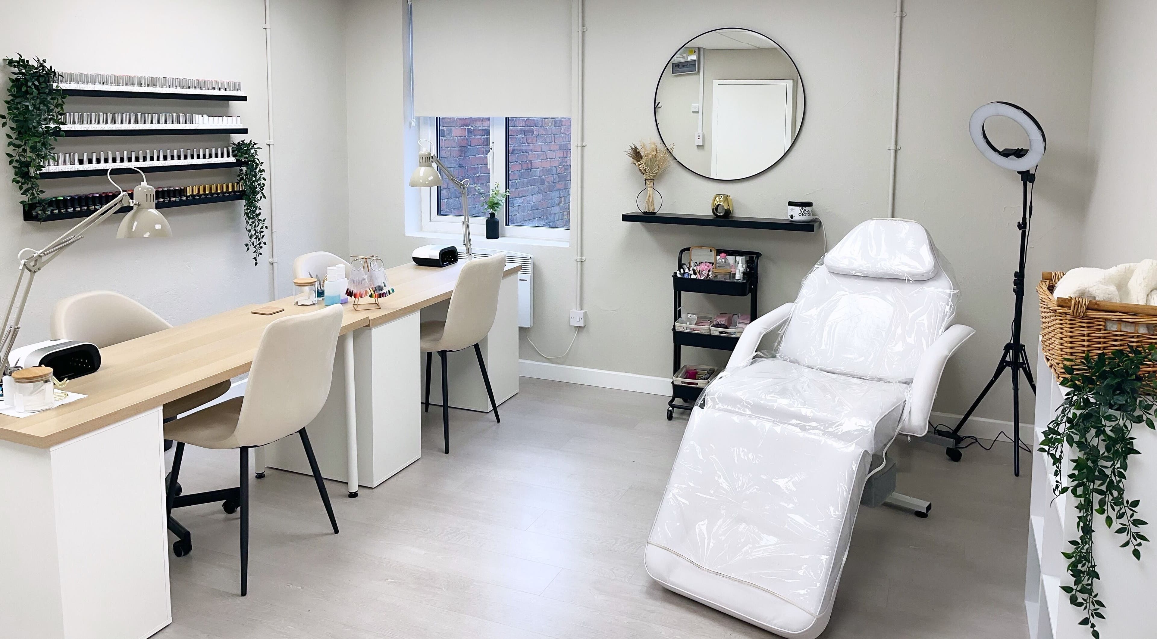 Relaxing treatment room at The Glam Studio, Farsley, Leeds, England, GB featuring stylish decor and equipment.