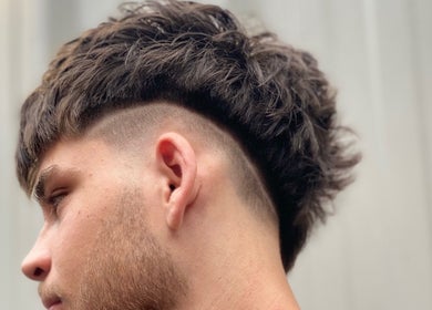 Modern undercut hairstyle at Marcushampton_hair, Glasgow, Scotland, GB. Styled for contemporary fashion.