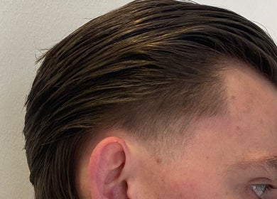 Close-up of sleek hairstyle at Marcushampton_hair, Glasgow, Scotland, GB.