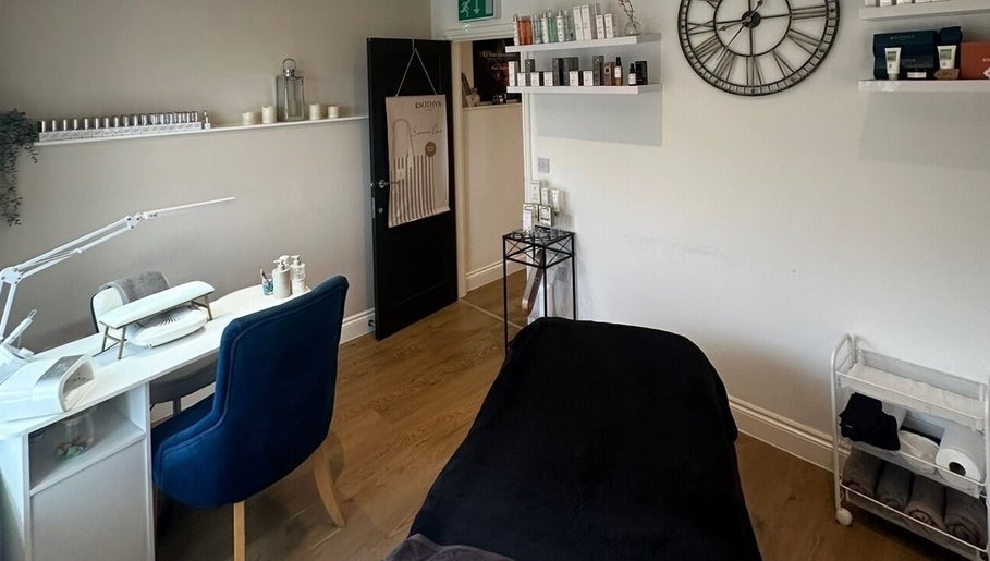 Relaxing treatment room at Rebecca at The Beauty Rooms in Langho, England, GB, featuring modern decor.