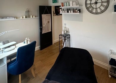 Relaxing treatment room at Rebecca at The Beauty Rooms in Langho, England, GB, featuring modern decor.