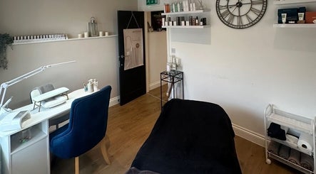 Relaxing treatment room at Rebecca at The Beauty Rooms in Langho, England, GB, featuring modern decor.