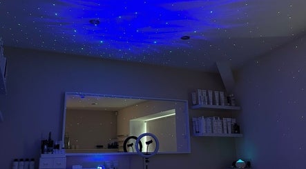 Atmospheric starry ceiling of Rebecca at The Beauty Rooms in Langho, England, GB offers a soothing ambience.