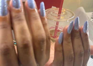 Sparkling blue nails at Lilian Beauty Salon, Juffair, Bahrain, BH. Perfect for a stylish look.