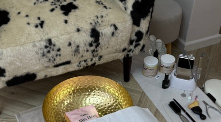 Luxurious spa setup at Glossy in Pontefract, England, GB with plush seating and beauty tools.