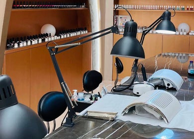 Nail spa setup at Stellar Salon in Riyadh, SA featuring polished tools and elegant decor.