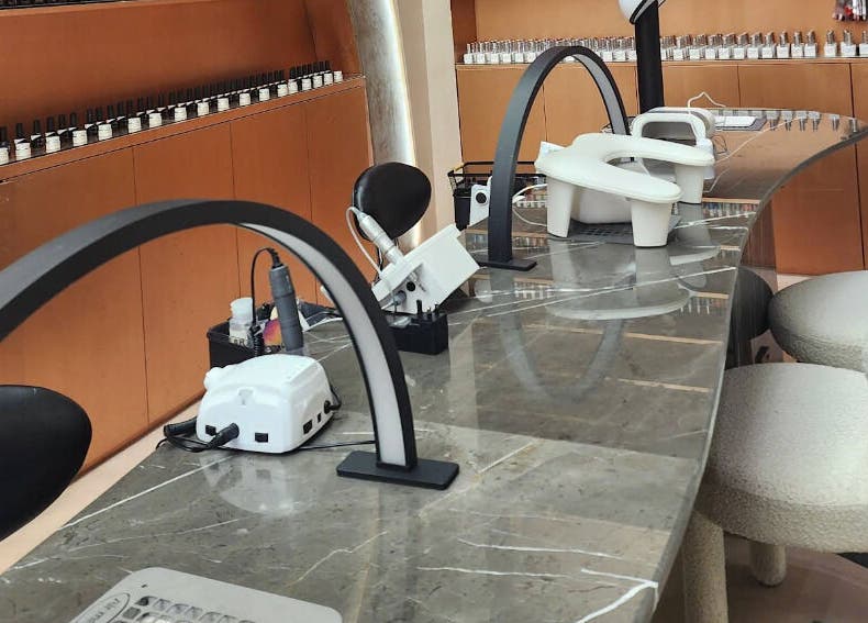 Elegant nail station at Stellar Salon, Riyadh, Riyadh Province, SA, showcasing modern decor and tools.