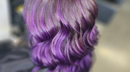 Purple wavy hairstyle at Alexandra Hair in Hucknall, England, GB. Captivating and stylish design.