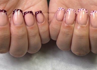 Stylish polka-dotted nails at Glamorous Nails & Lashes, Peterborough, England, GB.