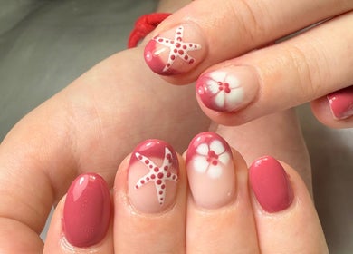 Elegant pink floral nail art at Glamorous Nails & Lashes, Peterborough, England, GB.