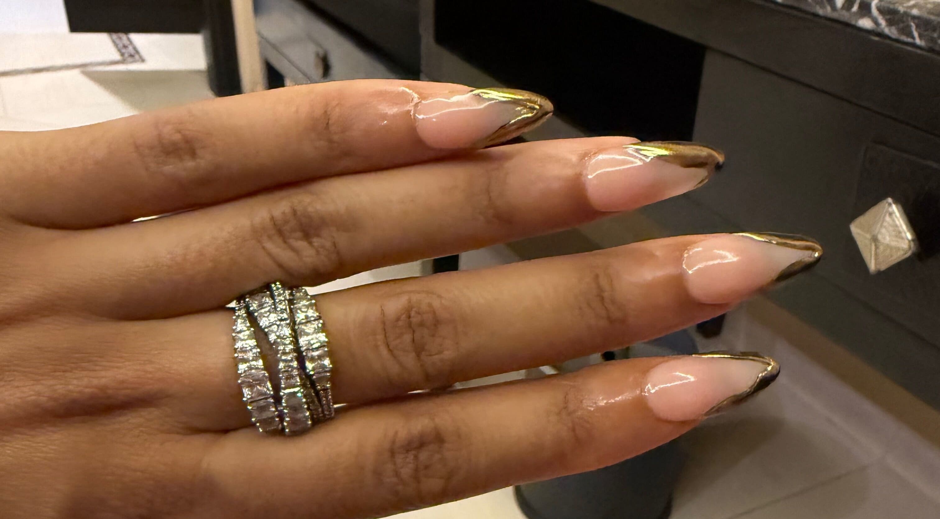 Elegant shiny nails at Glamorous Nails & Lashes in Peterborough, England, GB, showcasing intricate design.