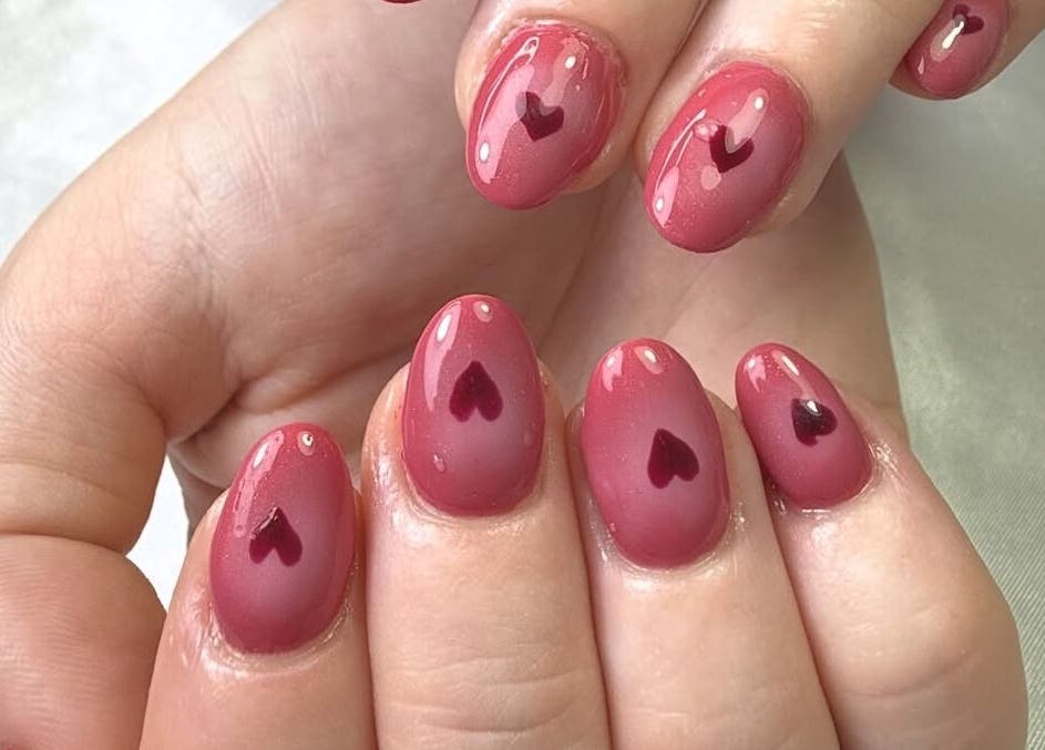 Elegant pink heart nail art at Glamorous Nails & Lashes, Peterborough, England, GB.