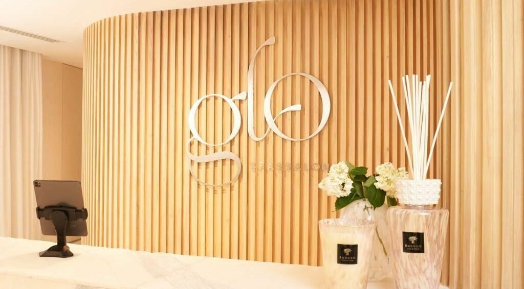Elegant reception area at Glo Spa & Salon, Al Khobar, Eastern Province, SA featuring modern decor and ambiance.