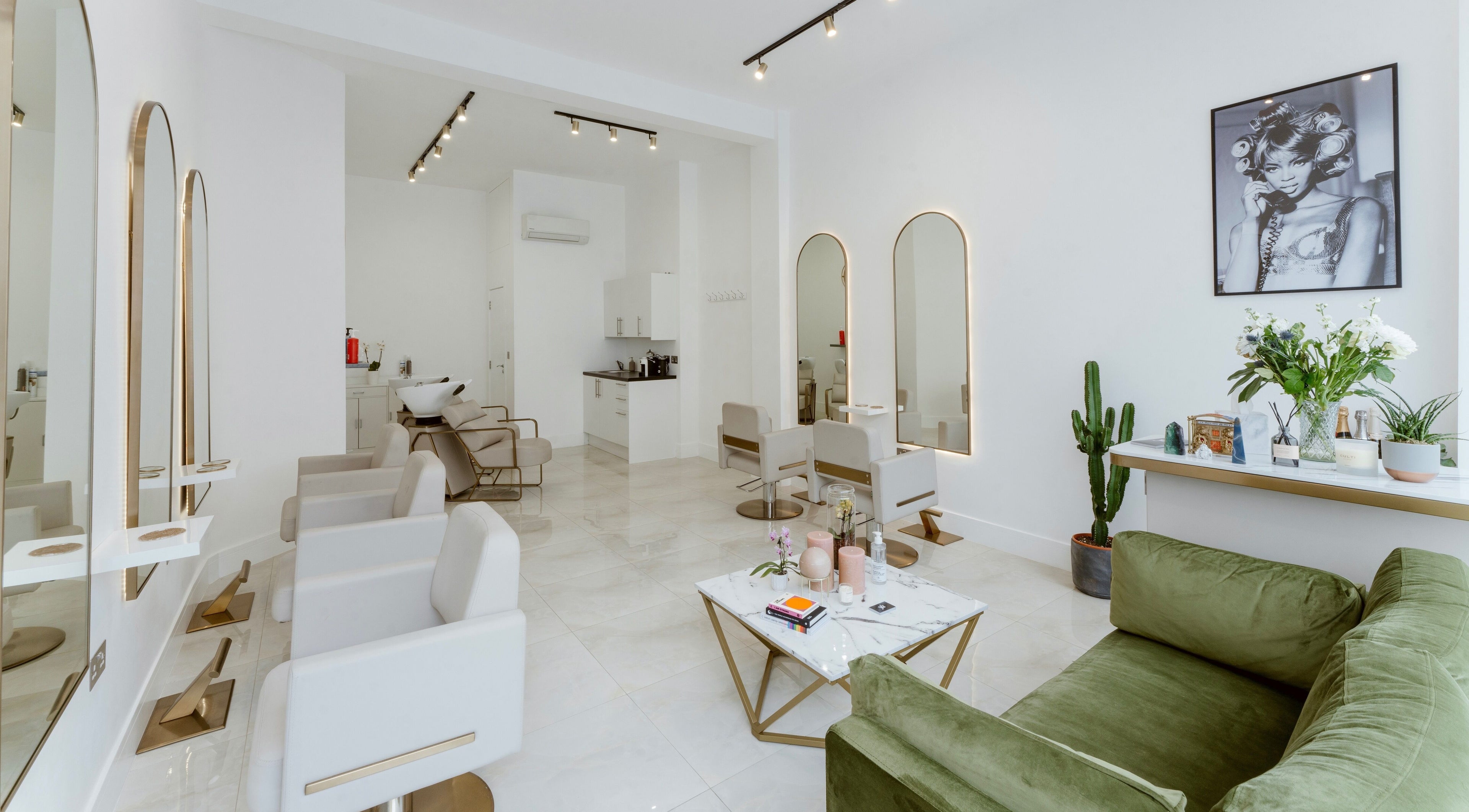 Modern chic interior of Yù Hair salon with stylish seating in London, England, GB.