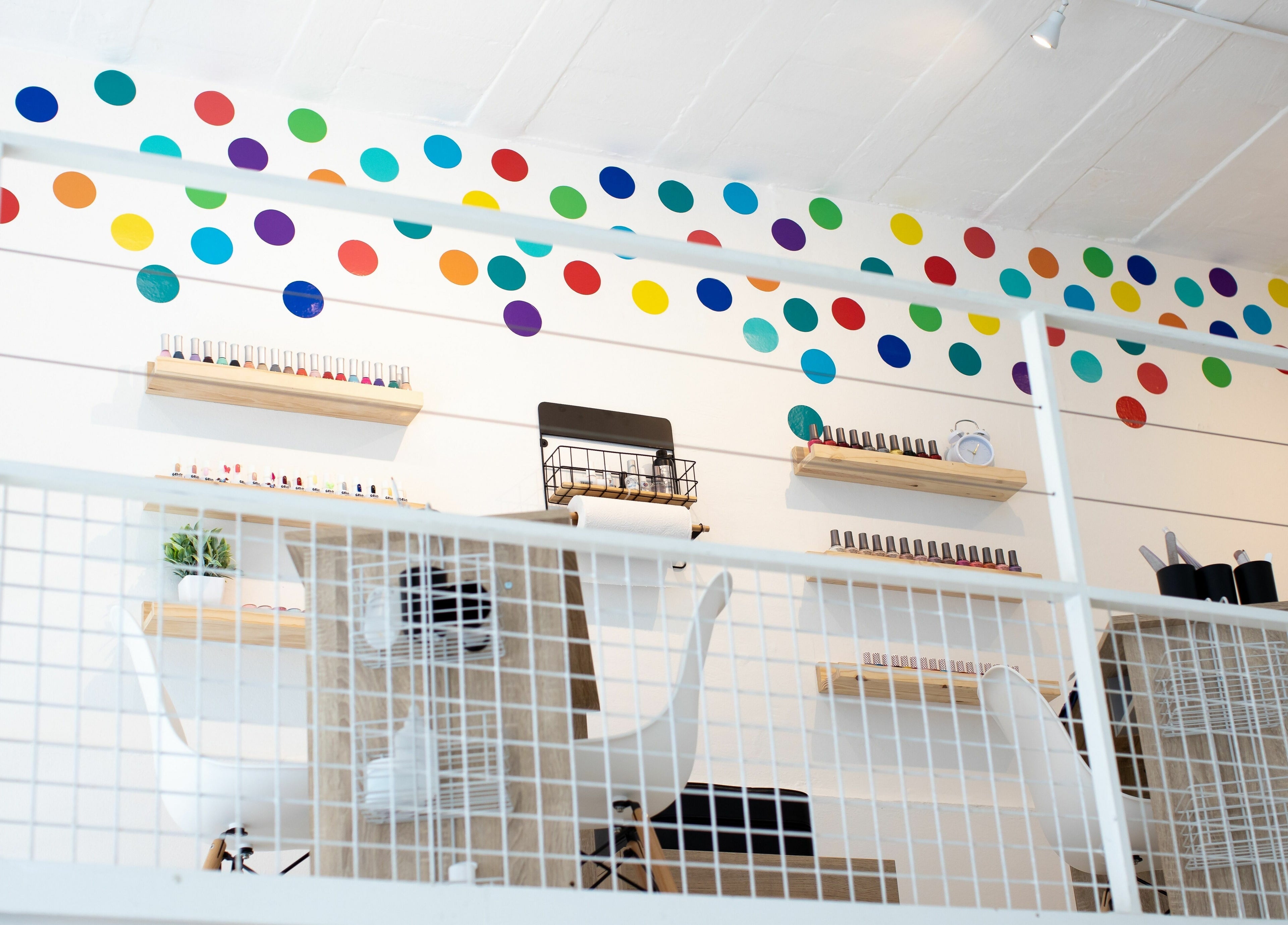 Snip Snap in Newlands, Cape Town: vibrant decor with dotted wall and chic furnishings for a stylish beauty salon.