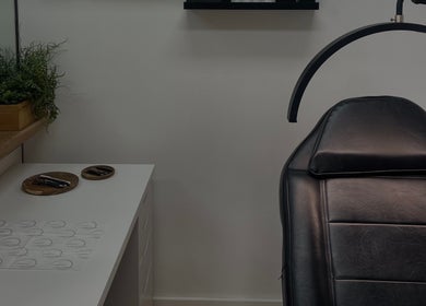 Luxurious treatment room at Arch Envy, Daventry, England, GB with sleek design and modern furnishings.